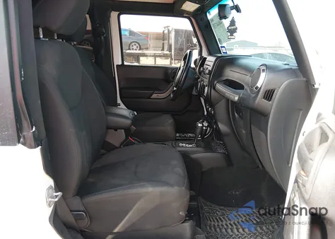 2015 Jeep Wrangler Willys Wheeler z USA, uszkodzony, nr VIN 1C4AJWAG5FL770914